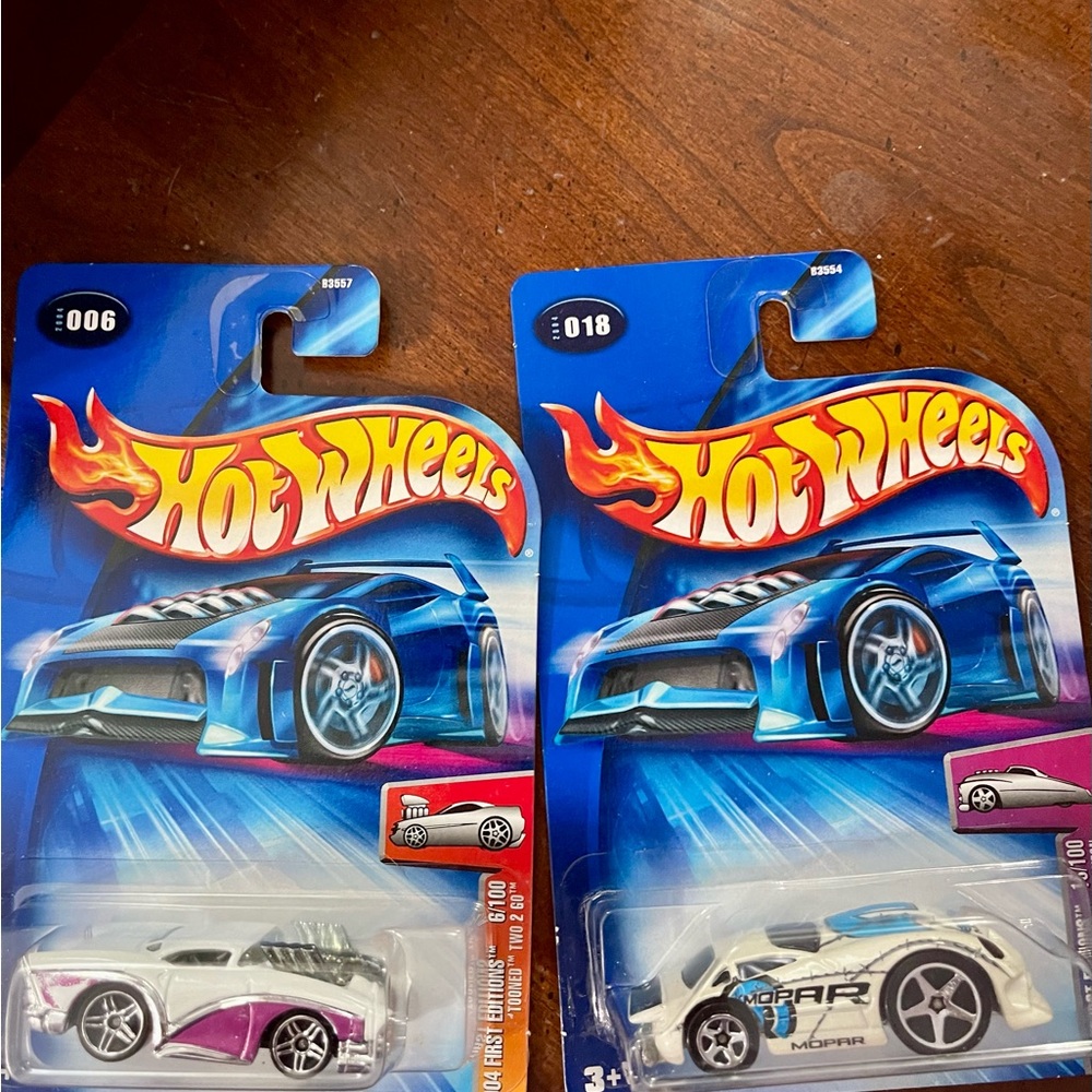 2 Hot Wheels Cars 2004 First Editions.  Tooned two 2 Go and Hardnoze Dodge Neon